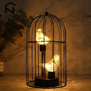 Creative Birdcage Iron Hollow Table Lamps luce calda portacandele Vintage lanterna camera da letto comodino scrivania luce per la decorazione domestica